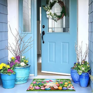 A colorful Easter-themed doormat featuring cute bunnies and eggs, perfect for adding a festive touch