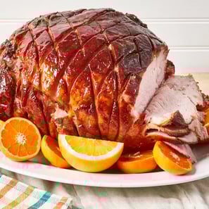 Glazzed honey ham for easter with orange slices