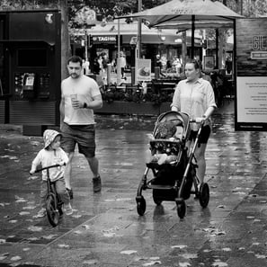 Family on a rainy day in Perth snapped by the lens of Peter Pickering