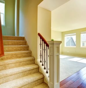 a staircase way with a wooden floor and stairs