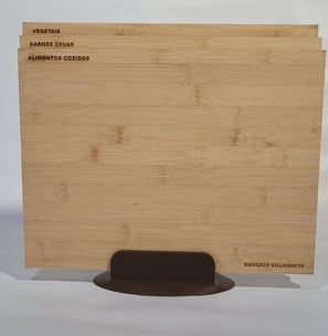 a wooden cutting board with a wooden cutting board