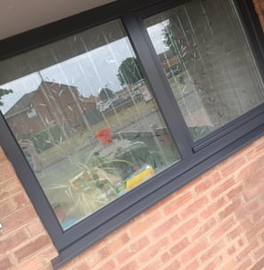 Finished dark grey UPVC windows after spraying on residential property in Worcester