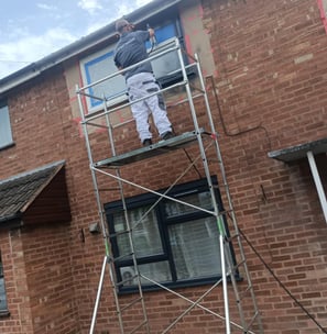 Mr Spray technician wearing protective gear for UPVC spraying in Worcester