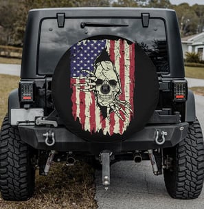 a jeep wrangling with a skull on it