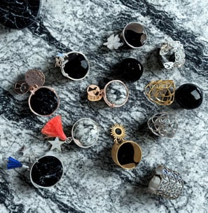 a bunch of rings and rings with a black and white background