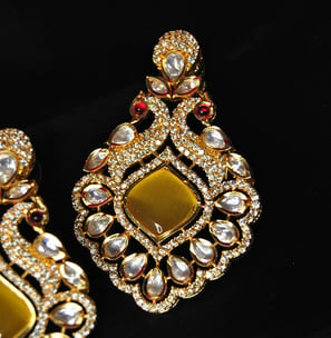 a pair of meenakari earrings