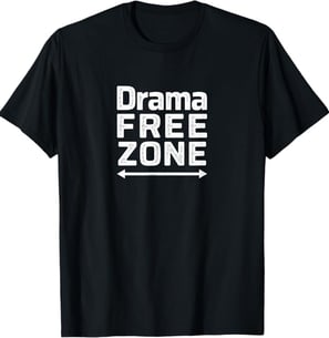a black and white t - shirt with the words drama free zone