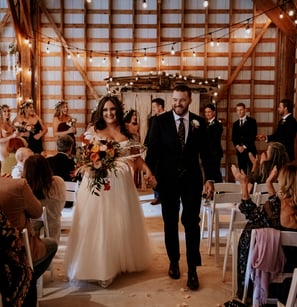 Bowen island rustic couple walking down the isle