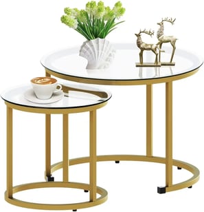 a coffee table with a vase and a vase with flowers
