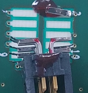 Connector with detached traces repair