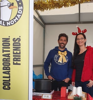 Two members of Portimão Digital Nomads selling mulled wine during Alvor’s Christmas Fair