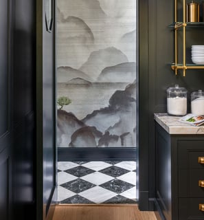 a kitchen with a black and white wallpaper and a black and white wallpaper