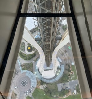 facing down through the glass floor of the space needle