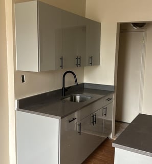 a kitchen with a sink and a sink