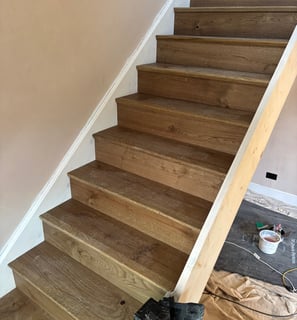 A brown oak staircase