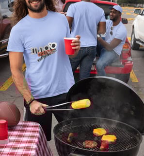 a man is holding a beer and a beer