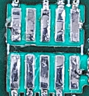Connector with detached traces repair - traces back