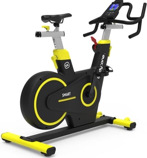 a stationary bike with a yellow and black bike