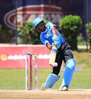 A Rwandese International playing shot during BATBALL MAXX 2025 Uganda