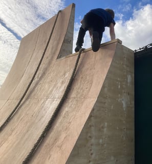 a man on a skateboard on a ramp