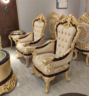 a room with a lot of chairs and a table