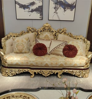 a couch with pillows and pillows on a table