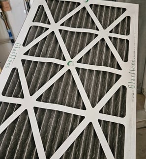 This furnace filter needs to go! Be sure to change yours AT LEAST twice a year!