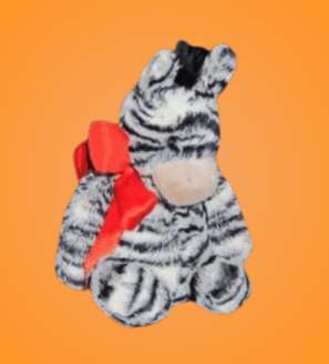 Stuffed zebra wearing a large red bow