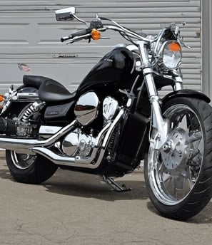 red and black sports bike