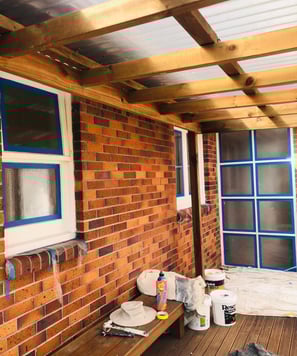 a bench with a bench and a window