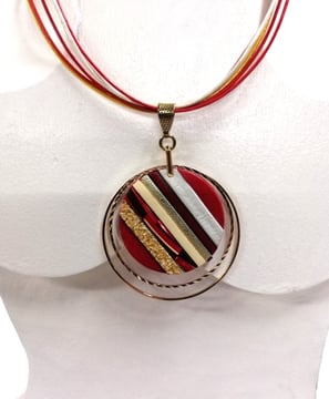 a necklace with a red and white striped necklace