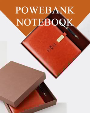 a notebook with a pen and a notebook with a note pad