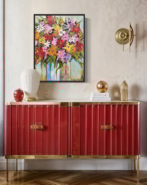 Painting of florals by Vera Walton in a living room space