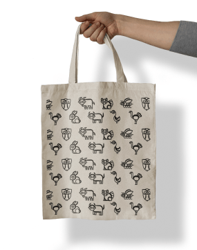 a person holding a bag with the animal icons