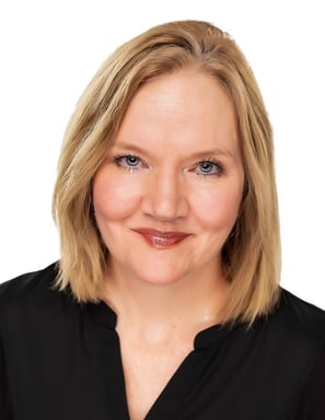 a woman with blonde hair and blue eyes