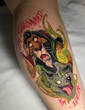 a tattoo of scar roi lion lion king on it's leg tattoo gap tatouage 05