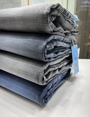 a stack of folded jeans