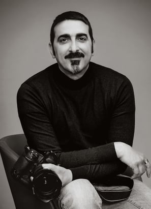a man with a mustache and mustache mustaches on his face