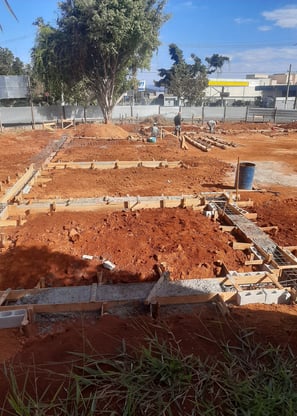 a construction site with a lot of concrete blocks