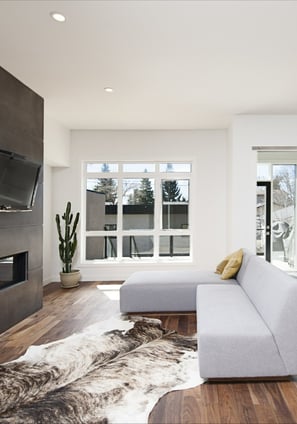 Beautiful interior shot of a modern house with white relaxing walls and furniture and technology