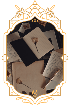 notebooks and roses in a victorian frame