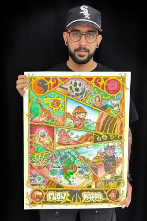 Flow Kappa Holdin a picture of one of his paintings about yokais