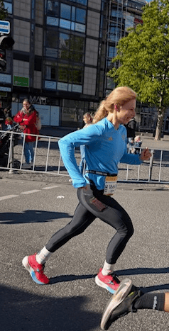 a woman running in a race