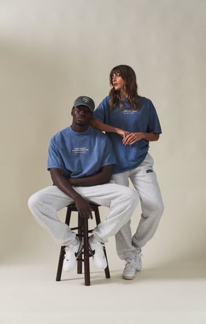 Flat lay product photography of custom t-shirts and hoodies for eCommerce