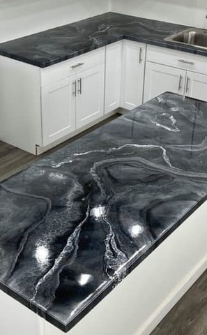 Epoxy countertops in Lincoln home- Dirty pour with grey, white, carbon black pigments