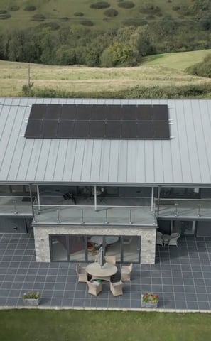 a house with solar panels on the roof 