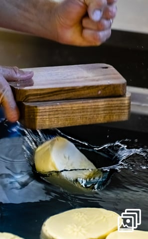 a person is making a butter