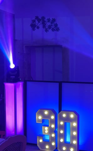 a dj booth with a dj booth and dj equipment