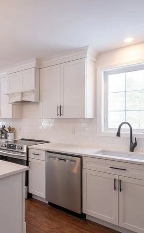 a kitchen with a large island and a large window
