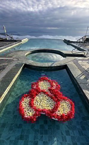 Lord Ganesha flower decoration on water